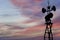 Contour small military radar station on the background of the sunset orange sky. Mobile relay station, Russia