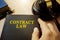 Contract law on a book and gavel