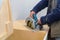 Contractor cuts the countertop for sink furniture on the kitchen using electric saw