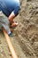 The contractor installs a sewer in a ditch and leads the pipe to the sump