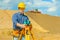 Contractor with theodolite