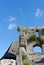 Contrail of the jet plane above Celje medieval castle in Slovenia