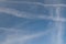 Contrails of airplanes in the sky of Huesca.