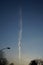 Contrails, condensation trails, against the blue sky. Berlin, Germany