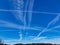 Contrails, traces of air traffic in the sky.