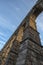 Contrapicado image of stone arches of the Roman aqueduct of Segovia