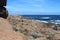 Contrast of red rocks and the blue ocean and sky at the Western Australian coast in the Leeuwin-Naturaliste National Park