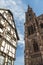 Contrast between Strasbourg Cathedral and old medieval house in