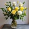 Contrasting Values: Yellow And White Rose Arrangement In Glass Vase