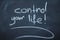 Control your life inscription on a blackboard
