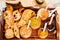 convenient portioned serving of bread with pate in small jars on a wooden tray.