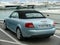 Convertible lighht blue Audi with black soft top