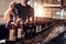 Conveyor with beer bottles moving in brewery factory