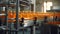 Conveyor belt, bottled juice in the beverage factory inside the factory, industrial production line, selective focus