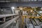 The conveyor belt of ingredients to the mixer. Workers in the workshop of the House-building plant. Industrial interior