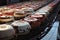 conveyor belt with many cakes on it