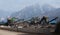 Conveyor belts with several piles of gravel in a plant under the Alps