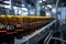 Conveyor belts shallow DOF spotlights beer bottles, showcasing manufacturing intricacies with focus