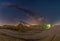 Conveyor bridge at night and the milky way, watching the stars at a construction area.