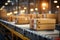 Conveyor line with cardboard boxes on it in distribution warehouse