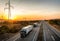 Convoy of blue lorry trucks on a highway