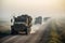 a convoy of military trucks driving down a dirt road