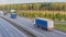 Convoy of trucks moving along the highway