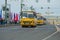 Convoy of yellow buses Ikarus