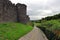 The Conway Castle on a cobblestone pathway in Wales