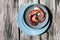 Coocked tentacles of octopus on ceramic plate