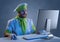 Cook chef working at a computer with keyboard and mouse