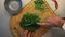 Cook chops parsley on board