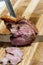 Cook cuts sliced meat picanha