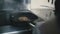 Cook fries a cutlet in a frying pan close-up