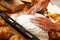 Cook hands preparing dough