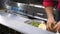 Cook hands in restaurant kitchen preparing a plate for clients