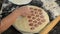 Cook kneads dough on dumplings with minced meat on a special form