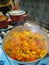 Cook peppers with onions, olives, parsley and carrots