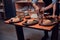 Cook picks up spices from jar for his indian dishes