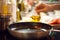 Cook pours oil on a skillet