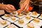 Cook prepared delicious gourmet canapÃ© starters on white plates