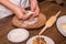 Cook prepares semi-finished dough and meat