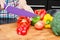 Cook preparing food, cut the peppers into slices