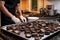 a cook prepping portobello mushrooms for grilling