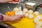 Cook puts sugar in the pies. Chef`s hands make stuffed pies close-up