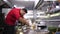 Cook in restaurant kitchen preparing an avocado salad