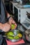 Cook`s hands clean the pear. Preparation of the pears to caramelize and cook chutney. Close up