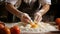 Cook\\\'s hands expertly incorporating an egg into a flour pile for cooking