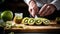 Cook slicing kiwis in a kitchen