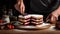 Cook slicing a Linzer Torte cake into slices